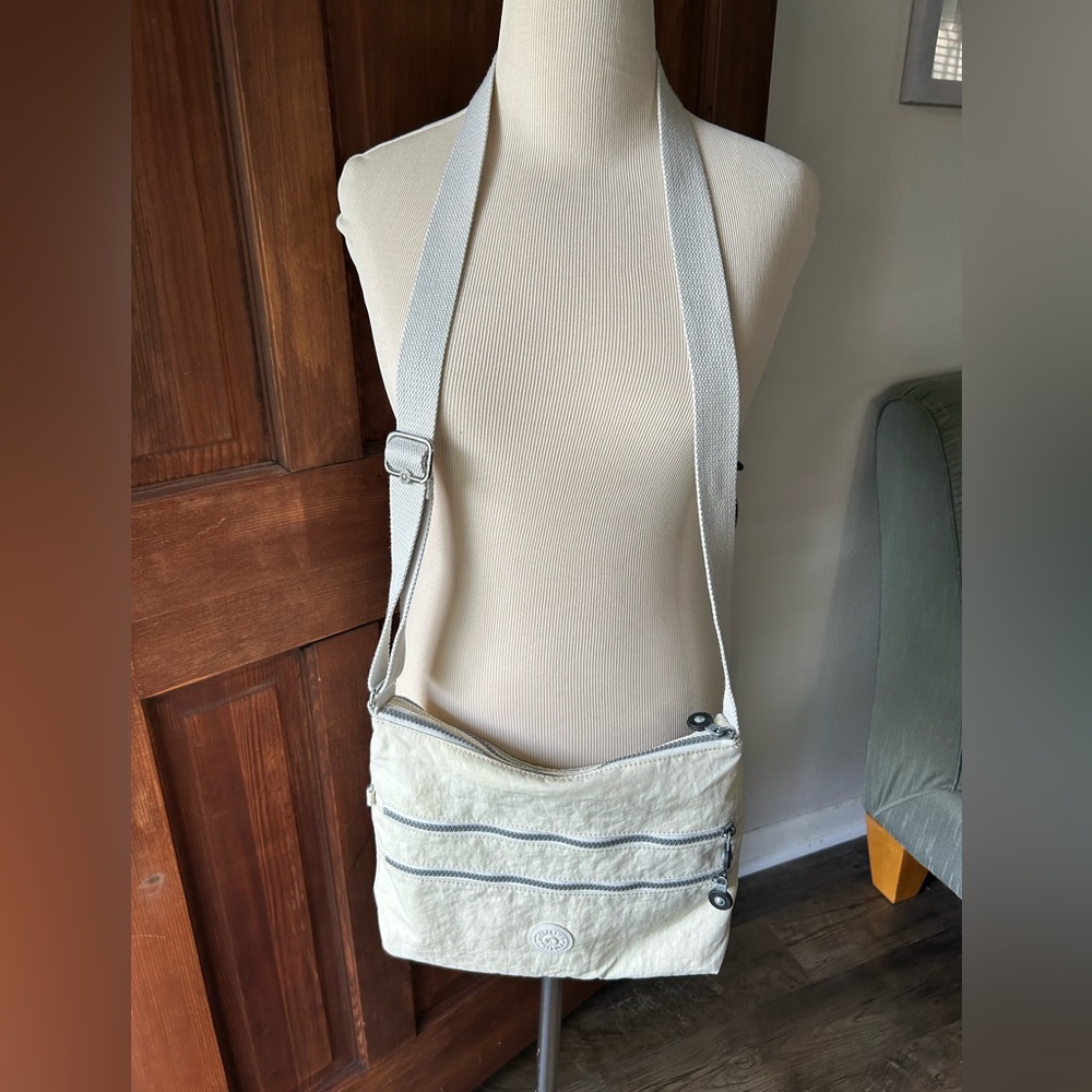 Kipling Cream Crossbody Bag with Triple Zippers